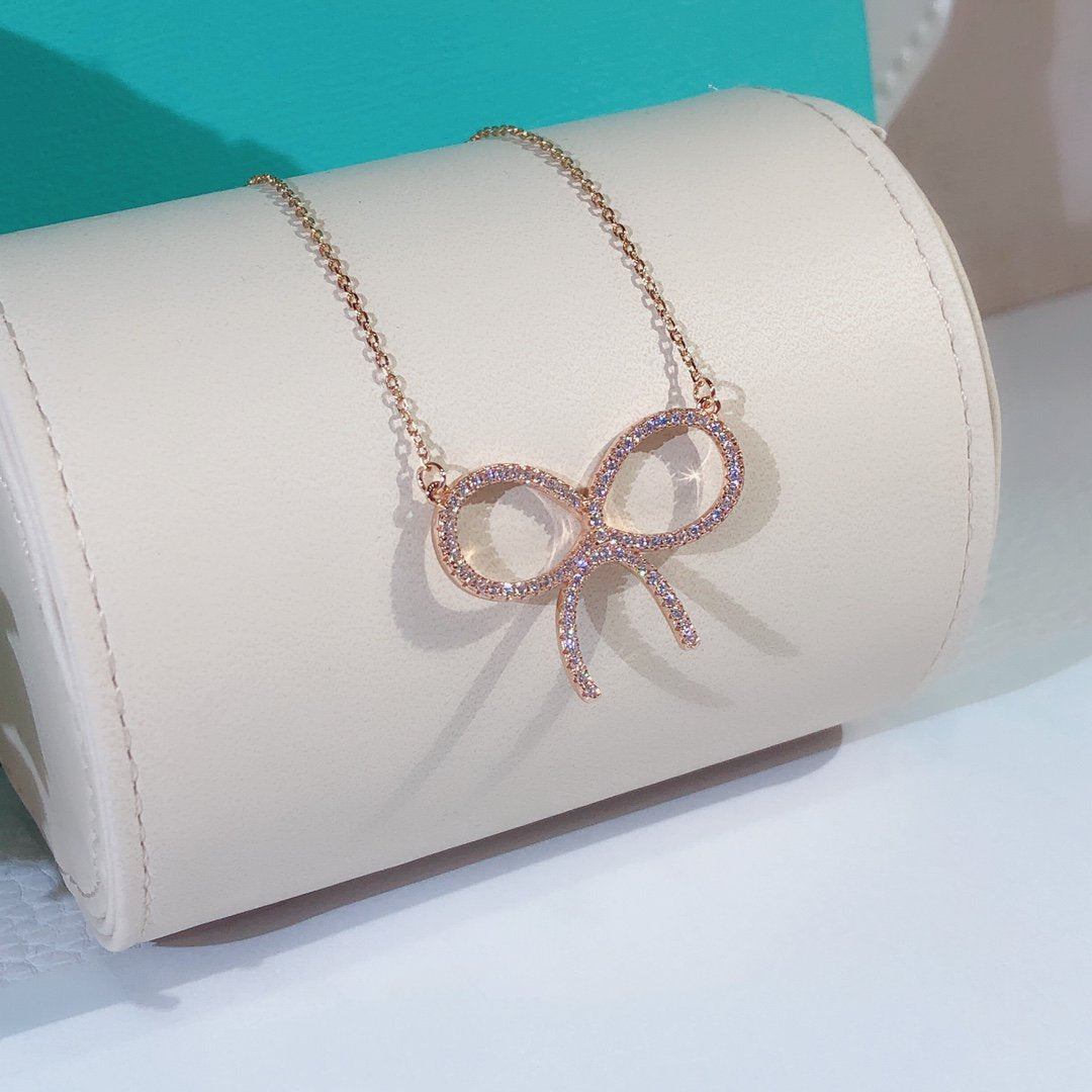 [Ornora Jewelry]CLAW SET RHODIUM PLATED BOW NECKLACE