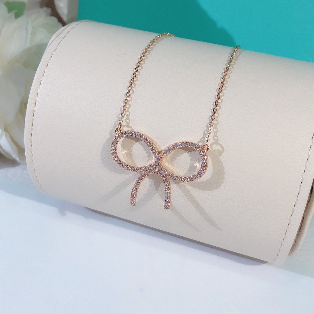 [Ornora Jewelry]CLAW SET RHODIUM PLATED BOW NECKLACE