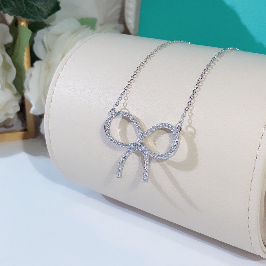 [Ornora Jewelry]CLAW SET RHODIUM PLATED BOW NECKLACE