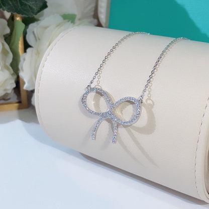 [Ornora Jewelry]CLAW SET RHODIUM PLATED BOW NECKLACE