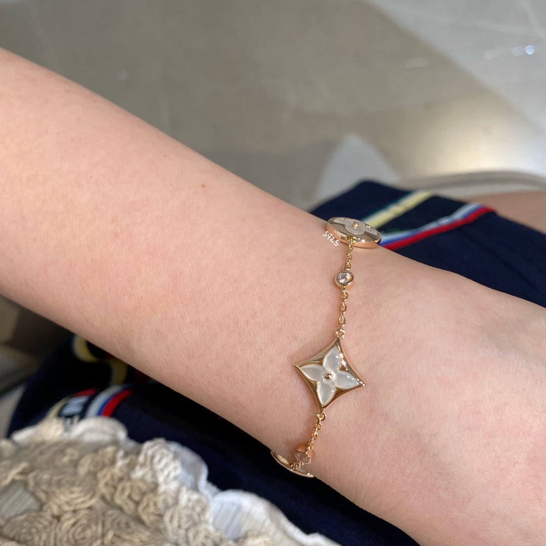 [OrnoraJewelry]OrnoraAND SUN 4 MOTIF WHITE MOP PINK GOLD BRACELET